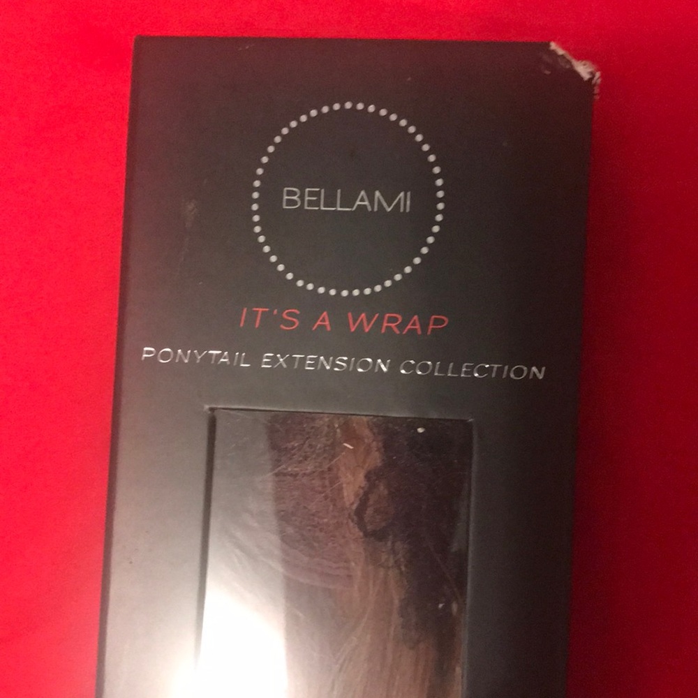 Human hair wrap by bellami.  Pony tail extension in color ash brown. 20 inches